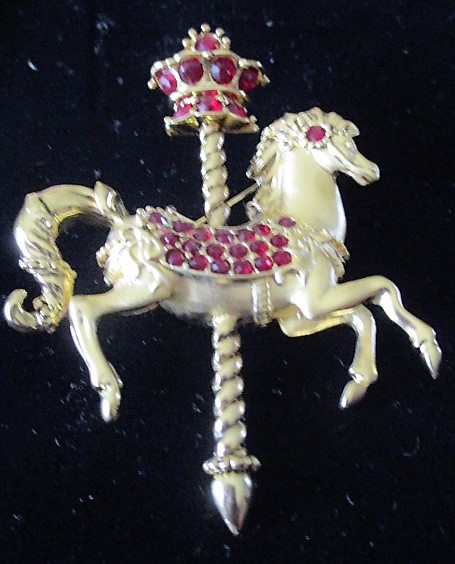 Franklin Mint Carousel of Pins (4 Rhinestone Carousel Horse Pins with Mirrored Stand)