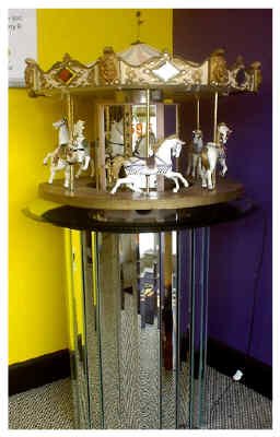 Mirrored Pedestal table for your Carousel